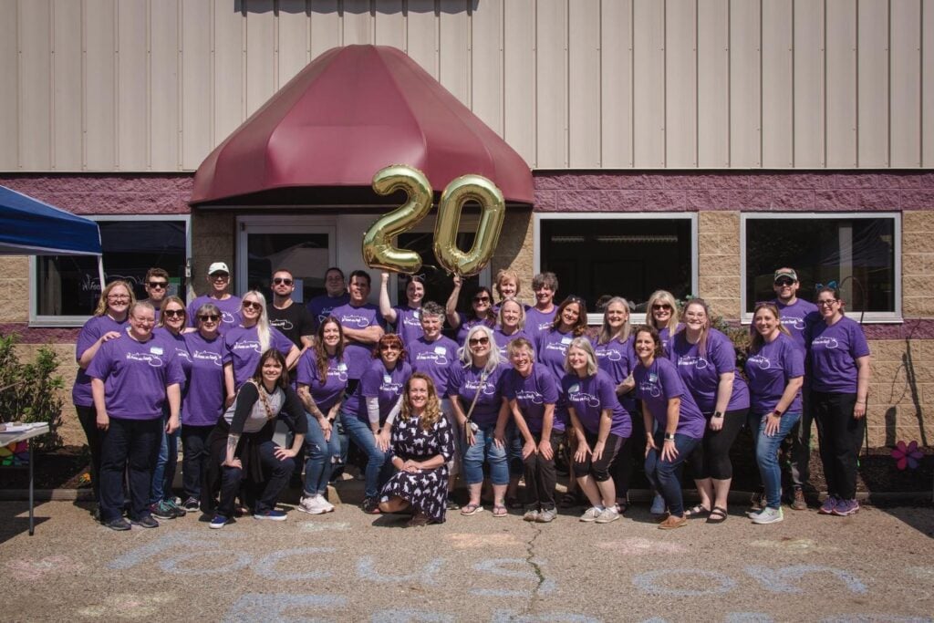 A picture of some of the volunteers for Focus on Ferals standing in front of the shelter.